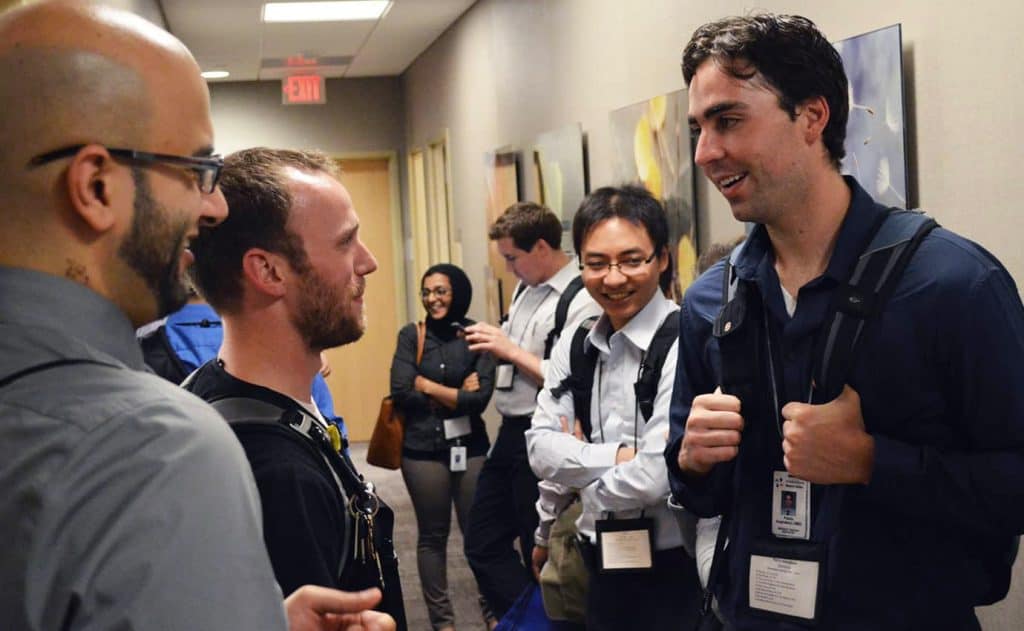 Transitional Year residents in the hallway with mentors