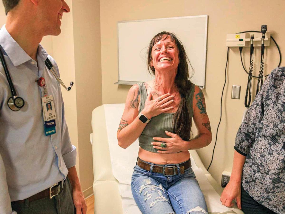 addiction medicine provider with patient in clinic