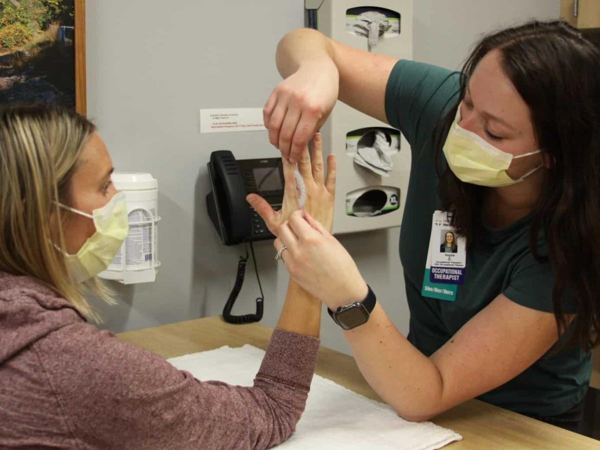 Physical therapist working with a patient