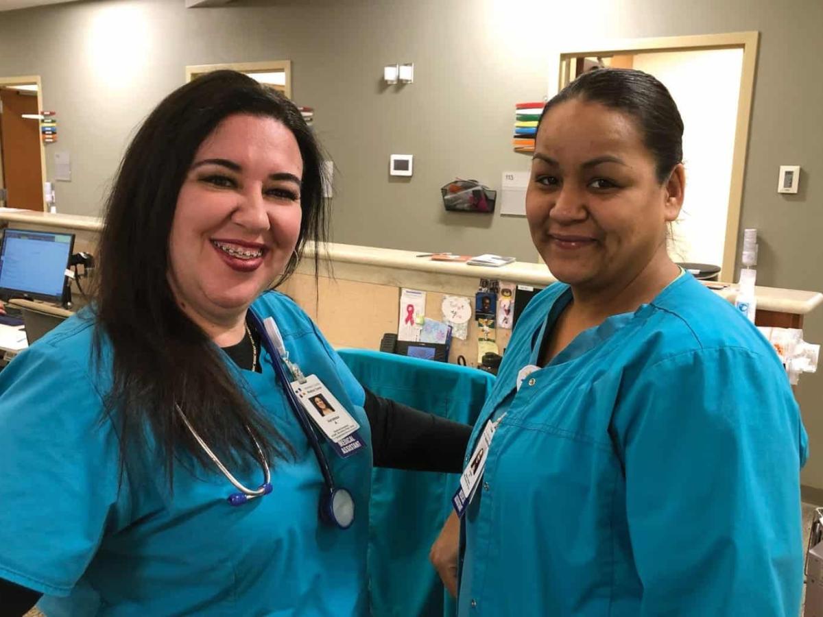 Medical assistants at nurses station