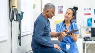 Elderly man with a provider