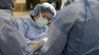 Surgery team performing surgery