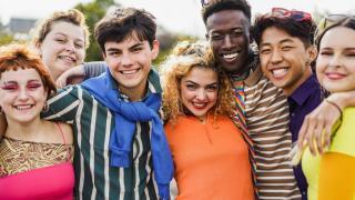 Young adults attending a pride parade