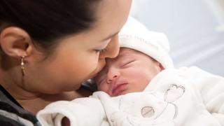 Young mom with newborn baby
