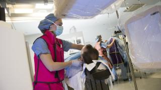 X-ray technician and patient