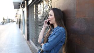 young white woman talking on cell phone, tips for patients, support for assault victims, support for victims of violence, support for victims of exploitation