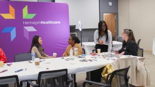 employees and staff in compass training session, health equity program