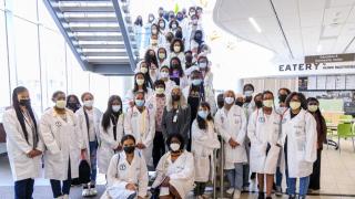 young black women attending the black women with stethoscopes youth summit at hennepin healthcare, black women with stethoscopes, youth summits, delivering culturally-centered care, hands-on experience, simulation center