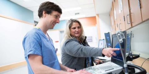 Nurse and doctor examining an ultrasound