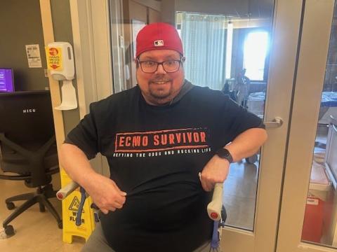 HHF patient story photo, young man in red hat