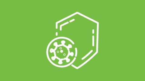 graphic icon of virus and shield on a green background