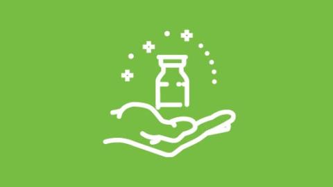 graphic icon of hand holding vaccine bottle on a green background