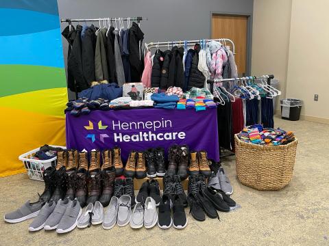 display of winter boots and clothes