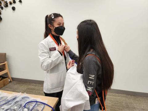 latine youth with stethescopes, latine youth with stethoscopes, black men with stethoscopes, medical education youth summits, medical ed for youth, latin youth