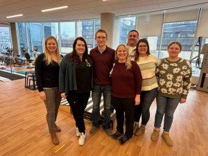 Brenden Bryce TBI OP Patient with therapists and family