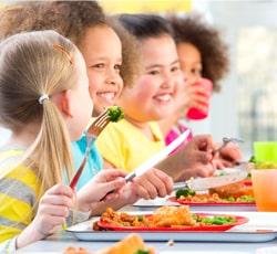 young kids in school lunchroom, dr cutts safety net champion, needs of underserved children, pediatric nutrition, nutrition needs of children, healthy food for kids