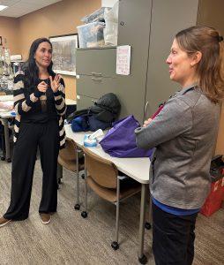 erin carlson tbi patient talking to nurse, tbi, patient story, therapy, PICU, grateful patient reunion, erin duffy carlson, car accident, head injury, glasgow coma scale