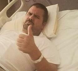 brain injury thumbs up in hospital