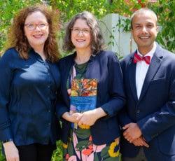 three award recipients outdoors