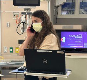 Miller On Phone, A day-in-the-life, NICU Medical Director, Dr. Cristina Miller, pediatrics, Neonatal Intensive Care Unit