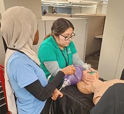 talent garden intern learning cpr up close with volunteer, talent garden interns, shadowing, youth of color, youth summits, healthcare mentorship