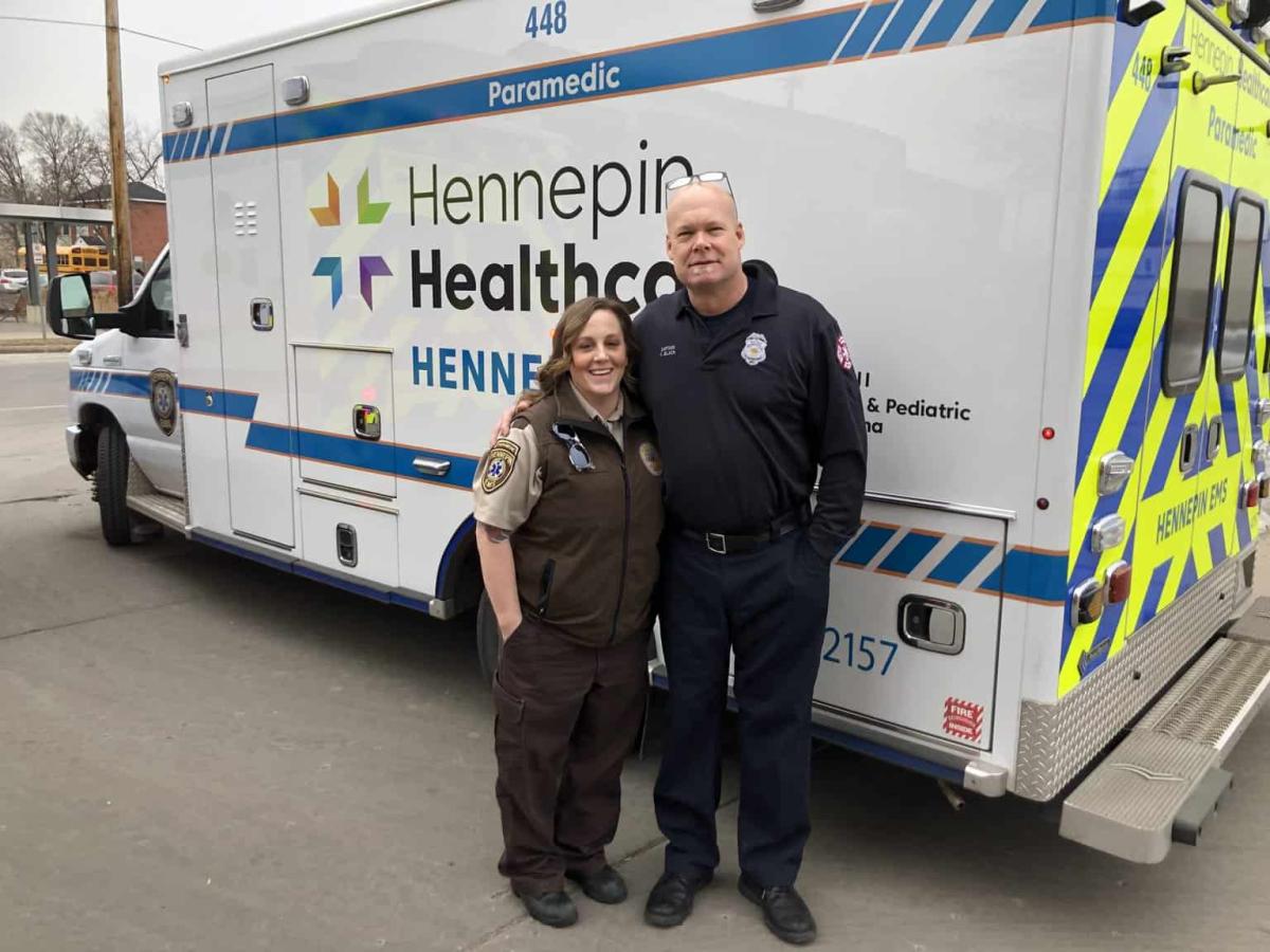 paramedics in front of hennepin healthcare ambulance, saving a life saver, cardiac monitors, 12-lead ecg capability, posterior myocardial infarction, cath lab activation, captain black, paramedics, stephanie young, derek smith