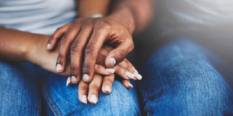 two people holding hands and offering emotional support, how can i help prevent suicide, suicide prevention, suicide prevention information