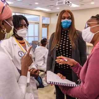 Black Youth with Stethoscopes working in a group