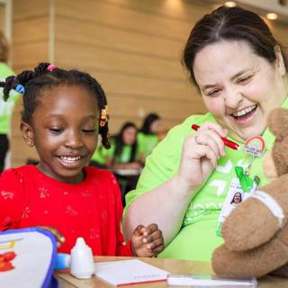 Provider checks a teddy bear