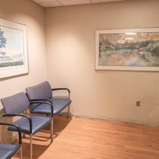 addiction medicine waiting room with chairs and artwork
