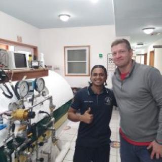 Ryan Wudtke by the Roatan Honduras Hyperbaric Chamber