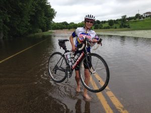 charlene barron with her bike, 9-time Ironman Triathlete holds fundraiser, support brain injury research at HCMC, charlene barron,